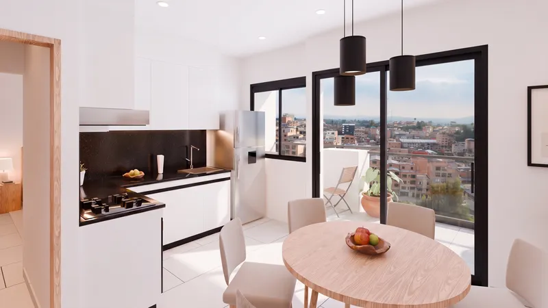 Comedor y cocina del apartamento 601 con salida a la terraza